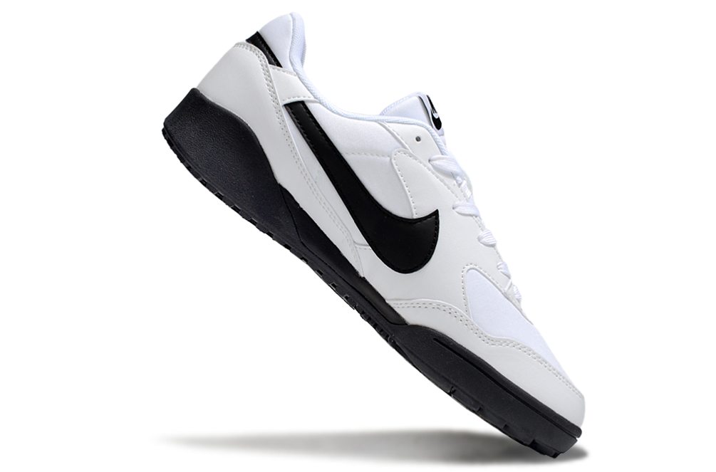 Chuteira Nike Terra Manta Society