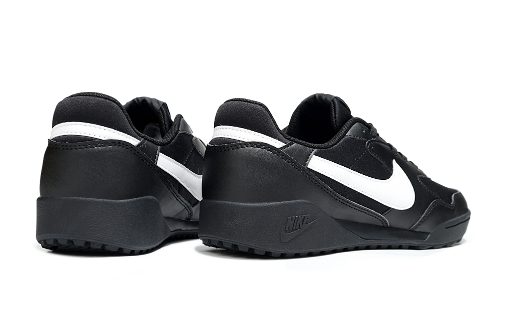Chuteira Nike Terra Manta Society