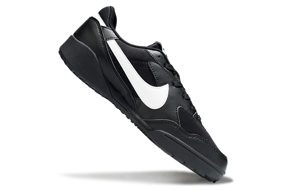 Chuteira Nike Terra Manta Society