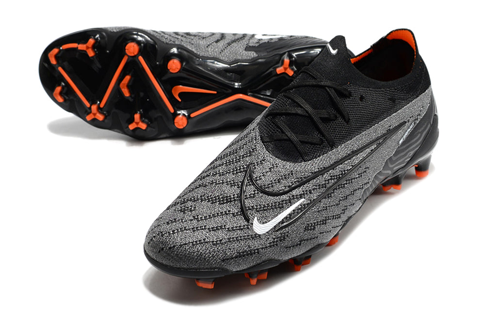 Chuteira Nike Phantom GX Low Elite FG Campo