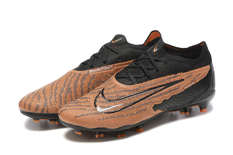 Chuteira Nike Phantom GX Low Elite FG Campo